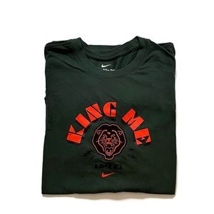 The Nike Tee color dark green and orange LeBron James King Me Dri-fit shirt